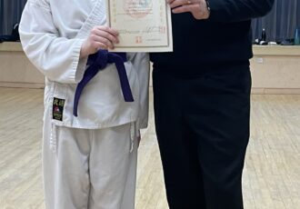 | Eleanor receives her 3rd Kyu certificate |