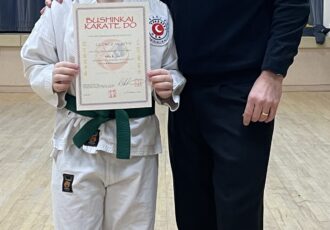 | George receives his 4th Kyu certificate |