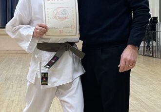 | Magdalena receives her 2nd Kyu certificate |