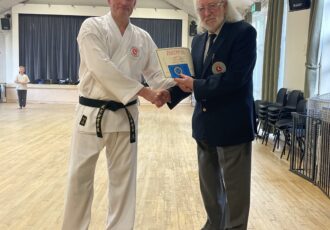 Darryl receives his 3rd Dan award from Sensei Reg