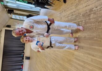 George receives his 3rd Kyu presentation