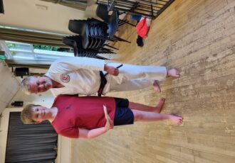 James receives his 8th Kyu presentation